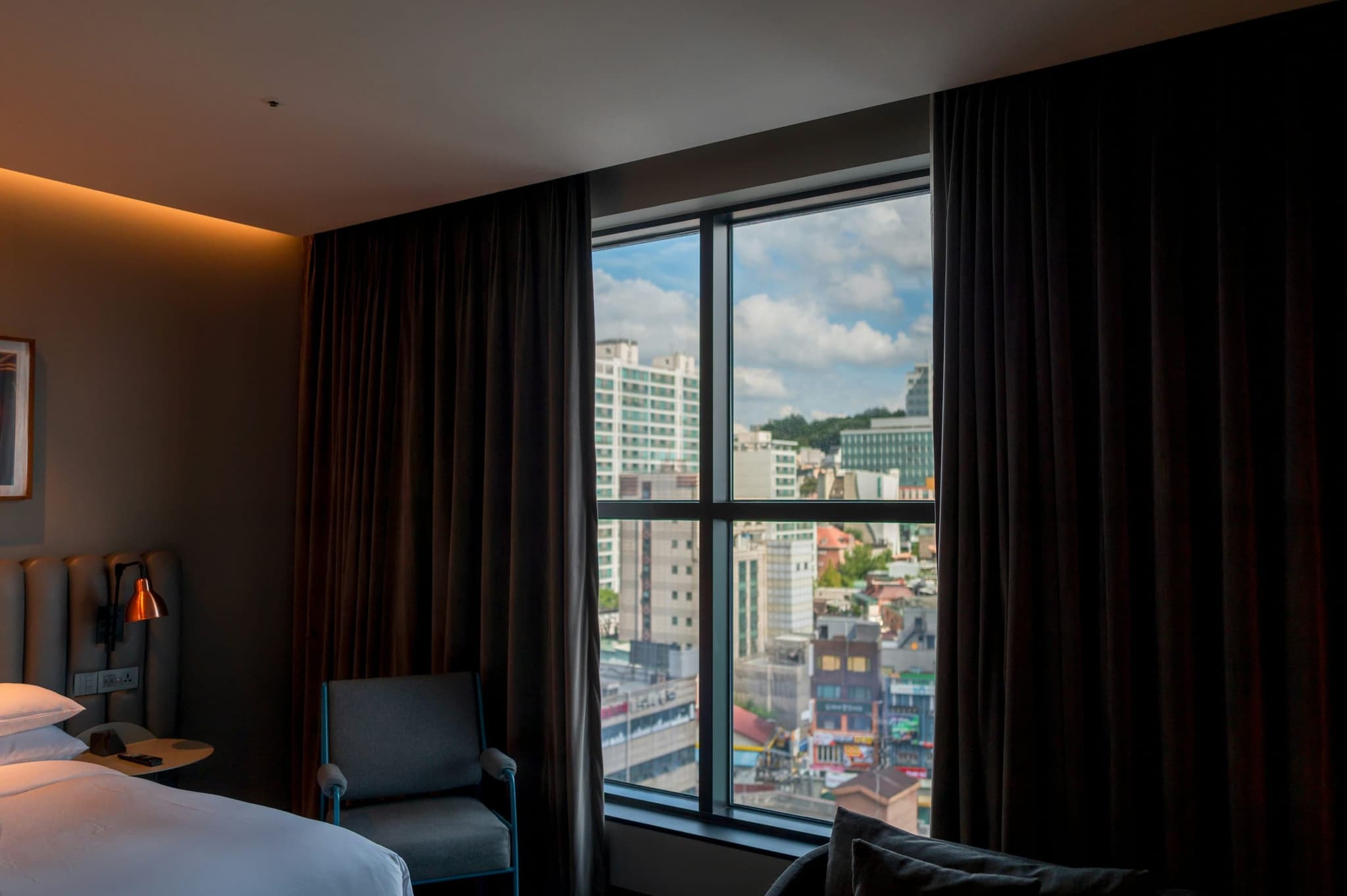 Bright hotel room overlooking the city